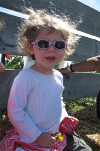 Little girl wearing sungalsses