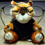Stuffed tiger wearing glasses